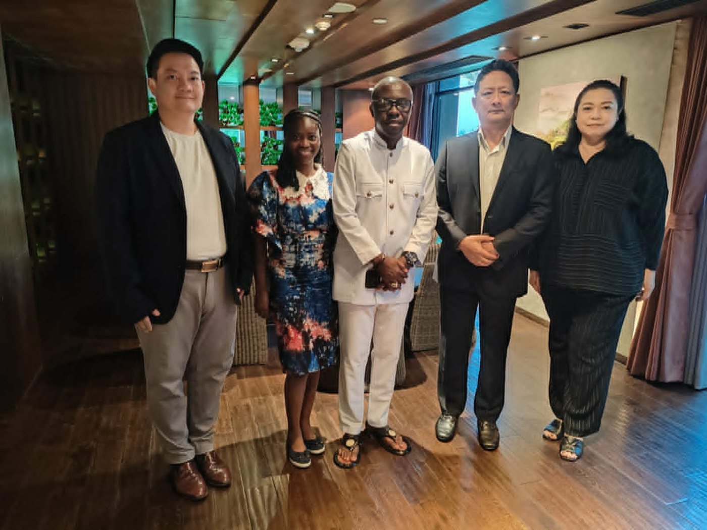 HRH Oheneba in a high-level business meeting with Asian partners