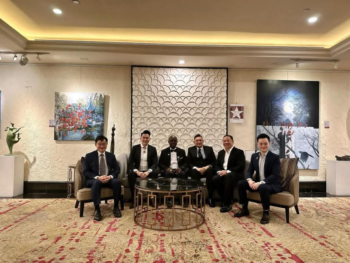 HRH Oheneba Nana Kwame Obeng II with a group at a formal engagement in Singapore